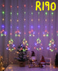 Colorful star-shaped LED lights hanging against a curtain with decorative items on a table below.